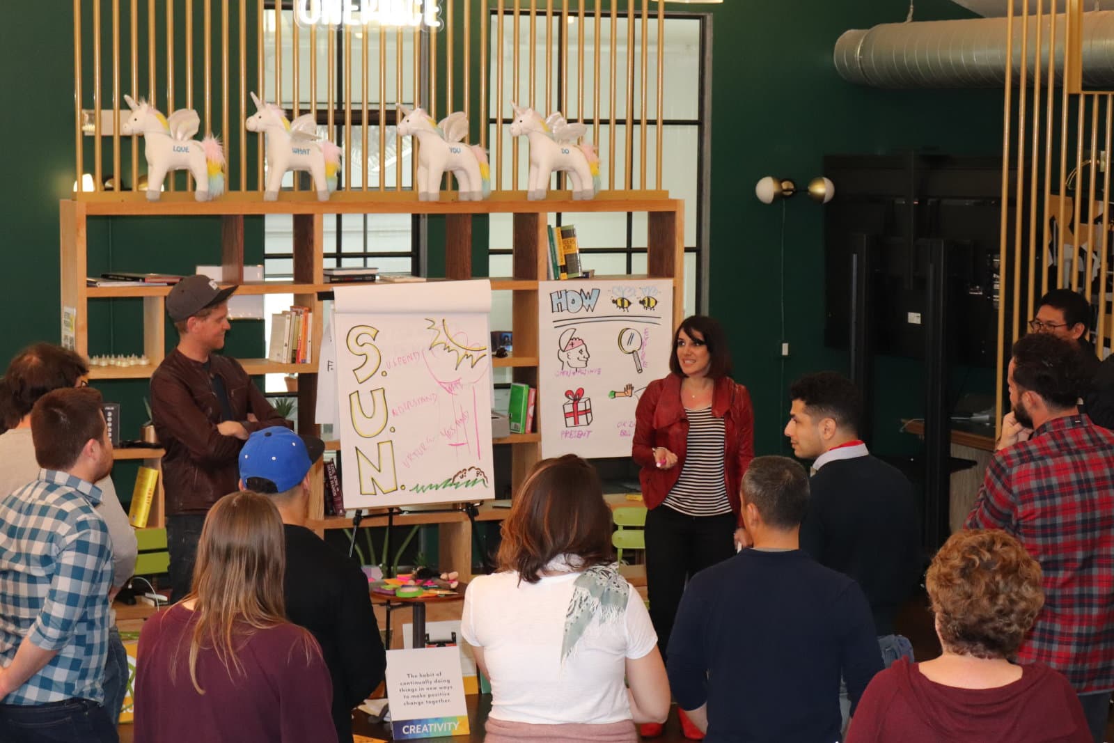 Workshop participants presenting hand-drawn storyboards